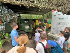Children and their parents visit the artillery semi-caponier.
